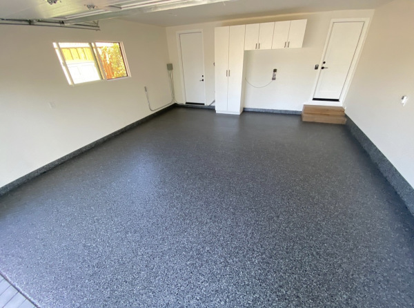epoxy floor coating with decorative flakes in a garage